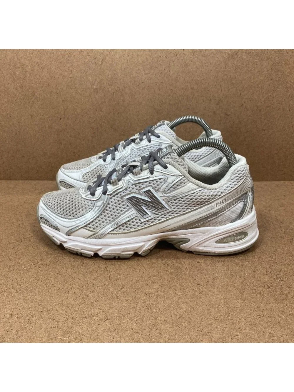 New Balance Women's Athletic Sneakers in White and Light Gray